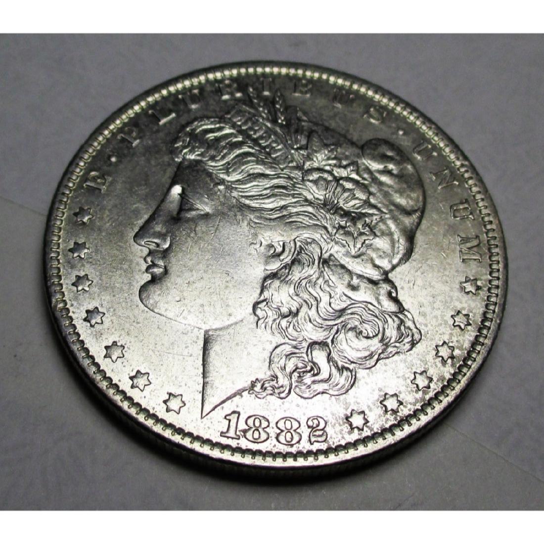 1882 O Tougher Date Morgan Silver dollar (1 of 2)