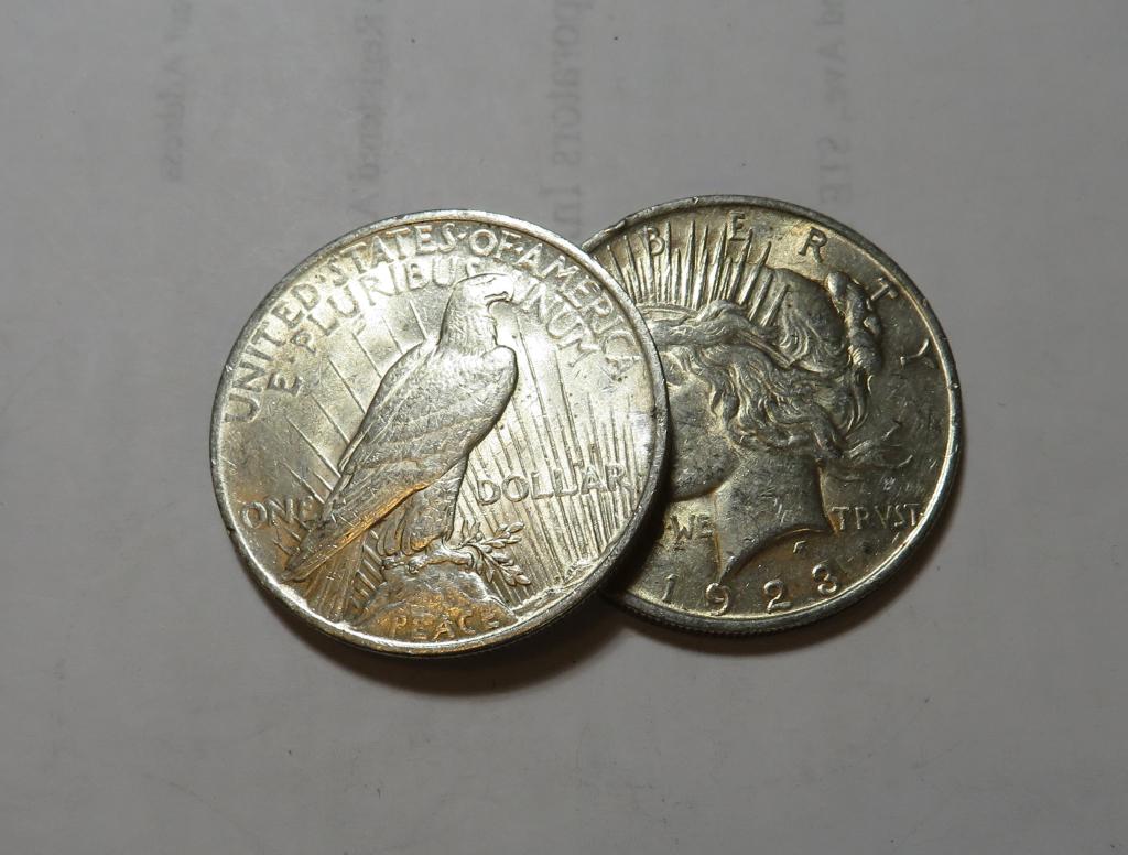 (2) 1923 AU Grade Peace Silver Dollars (1 of 2)
