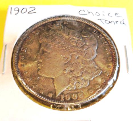 1902 CH AU Toned Morgan Silver Dollar (1 of 2)