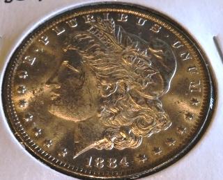 1884 O Bu Grade Morgan Silver Dollar (1 of 2)