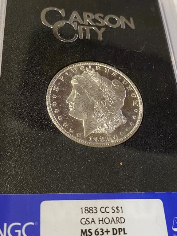 1883 CC GSA MS 63+ DPL NGC Banded Morgan $1 (1 of 3)