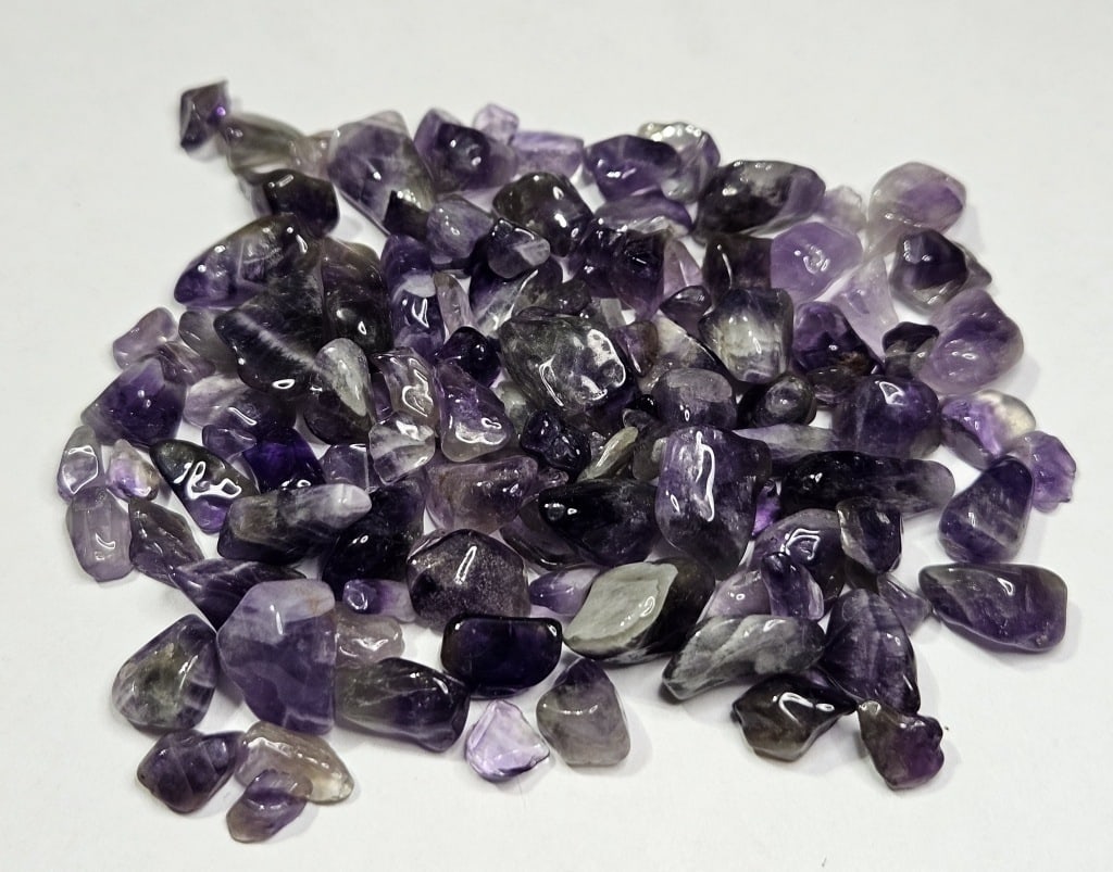 29.77 grams Natural Amethyst Chips: Items are the exact items in the image - Bidder is responsible for all value and grade determination - Please review the entire terms and conditions prior to placing any bids- Any bid is an agreement