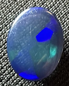 1.44 ct. Natural Black Welo Opal Blue Flash