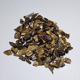 110.25 tcw. Natural Tiger Eye Tumble Chips