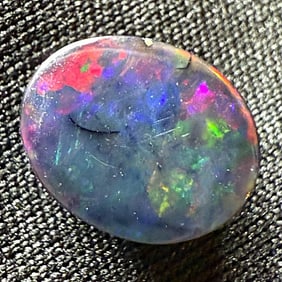 1.38 ct. Natural FABULOUS RED FLASH Rainbow Opal