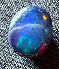 1.47 ct. Natural Welo Black Opal Blue/Red Flash