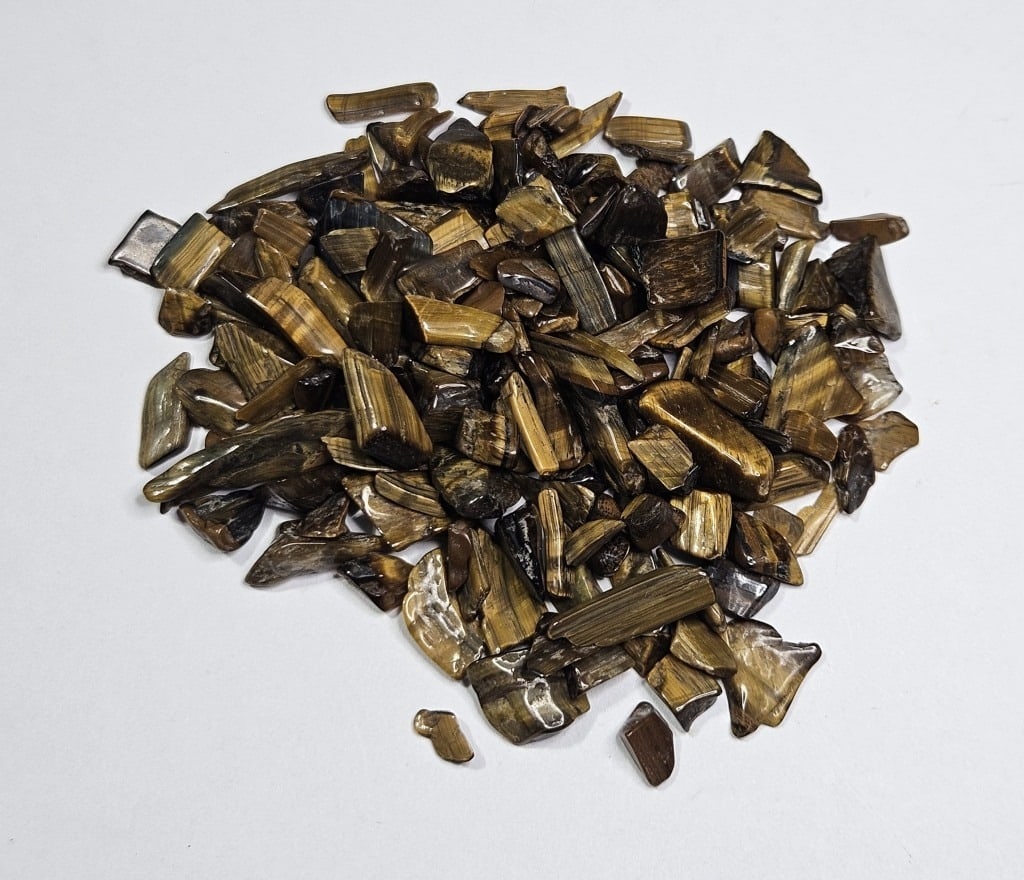 125.9 tcw. Natural Tiger Eye Tumbled Chips: Item is the item in the image - Bidder is responsible for all value and grade determination - Please review all terms and conditions prior to placing any bids- All bids are an agreement to all terms -