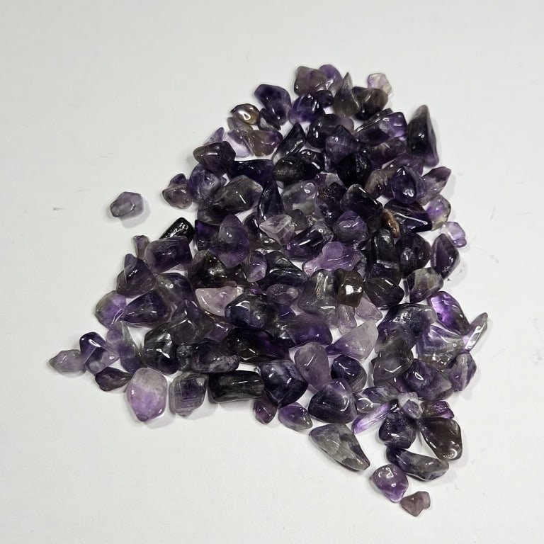 185 tc. Natural Amethyst Tumbled Chips: Item is the item in the image - Bidder is responsible for all value and grade determination - Please review all terms and conditions prior to placing any bids- All bids are an agreement to all terms -