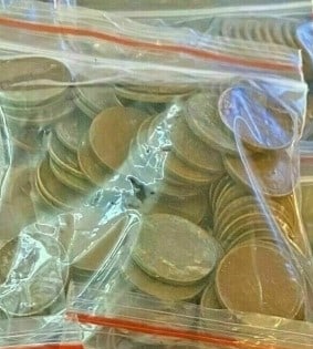 A Bag of (100 unsearched Lincoln Wheat Cents: An unsearched bag counted from large hoard into parcels of 100 pcs.