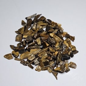 110.25 tcw. Natural Tiger Eye Tumble Chips