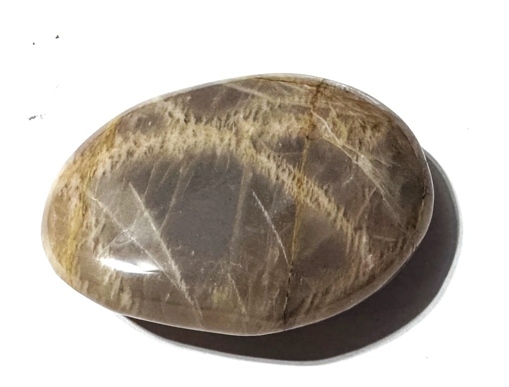 38 gram Peach Flashy Moonstone Palm Stone: Item is the exact item in image - Bidder is responsible for all value and grade dtermination - Please review all terms and conditions