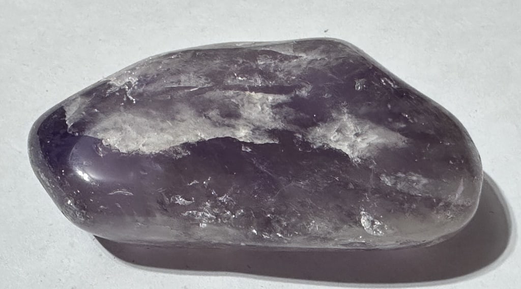 Large Tumbled Amethyst Stone: Items are the exact items in the image - Please review the entire terms and conditions prior to placing any bids - Any bid is an agreement to all terms and conditions -