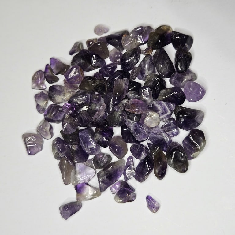 127.65 tcw. Natural Amethyst Tumbles: Item is the exact item in the image - Bidder is responsible for all value and grade determination -