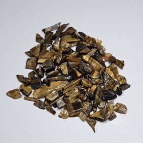 110.25 tcw. Natural Tiger Eye Tumble Chips