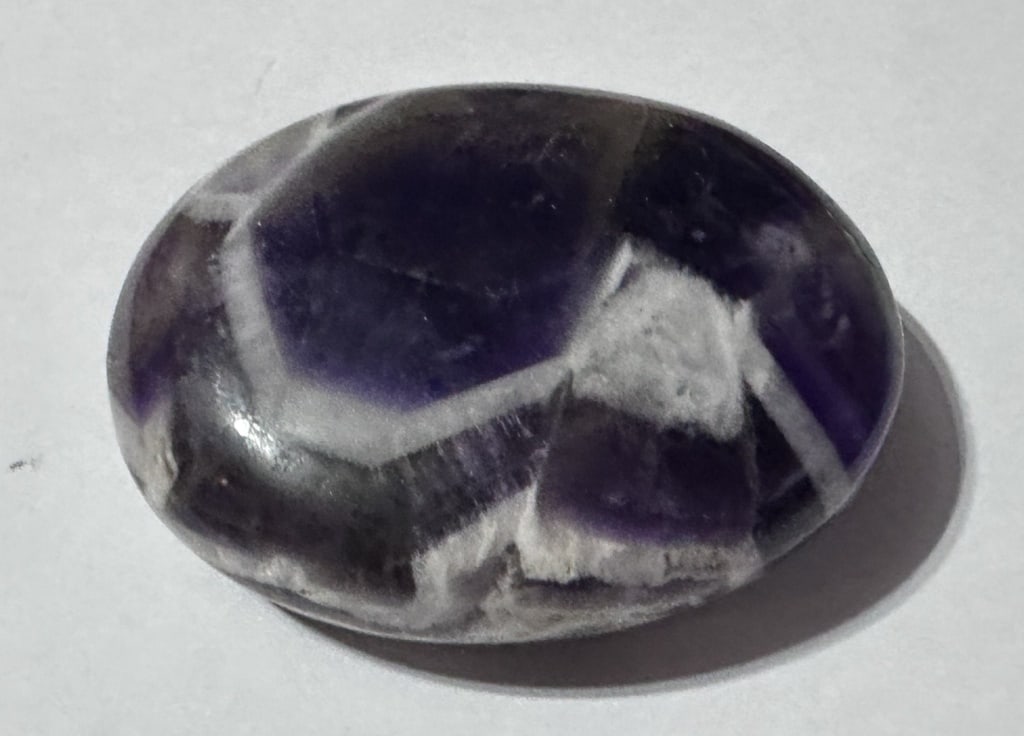 85.44 gram Dream Amethyst Palm Stone: Item is the exact item in image - Bidder is responsible for all value and grade dtermination - Please review all terms and conditions