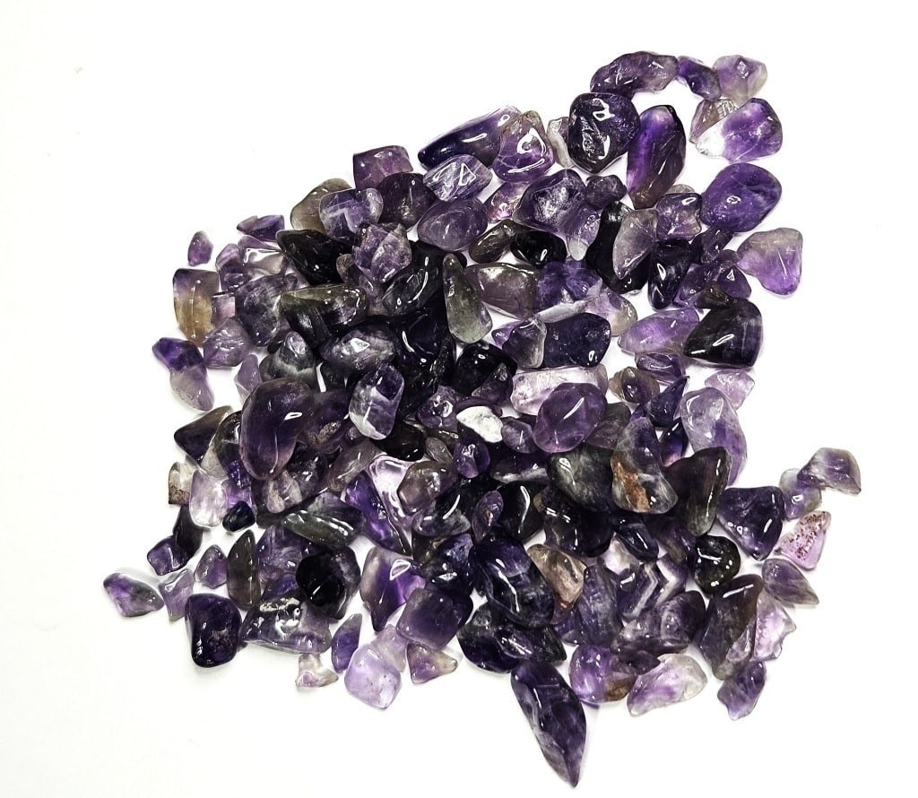 31.97 grams Natural Amethyst Tumbled Chips: Item is the item in the image - Bidder is responsible for all value and grade determination - Please review all terms and conditions prior to placing any bids- All bids are an agreement toallterms-