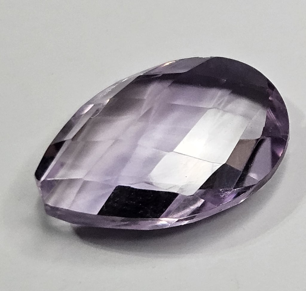 5 ct. Pear Shape Amethst Gemstone: Item is the exact item in the image- Bidder is responsible for all value and grade determination- Please review all terms and conditions prior to placing any bids - All bids are an agreement to pay fo