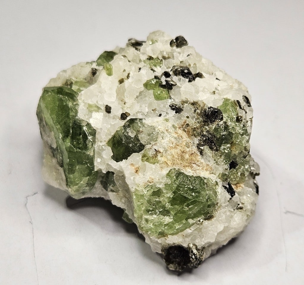 61.33 gram Chrome Diopside Specimen in Quartz: Item is the exact item in the image - Bidder is responsible for all value and grade determination -
