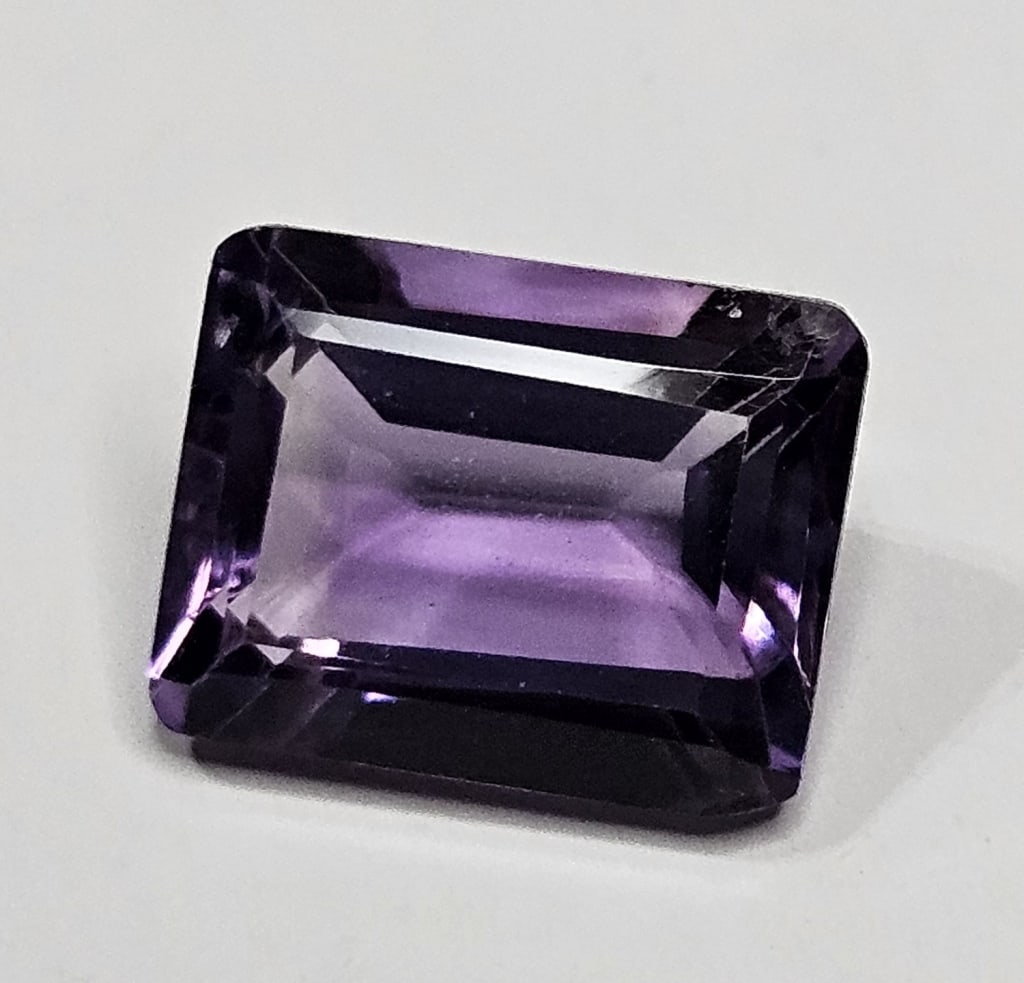 3.15 ct. merald Cut Amethyst Gemstone: Item is the exact item in the image - Bidder is responsible for all value and grad determination - Please review all terms prior to plaicng any bids- All sales fianl and all bids are an agreement