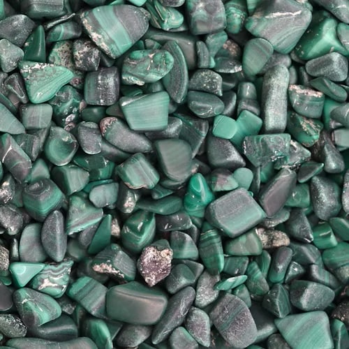 40 grams of Natural Malachite Chip Tumbles: Items are the exact items in the image - Please review the entire terms and conditions prior to placing any bids - Any bid is an agreement to all terms and conditions -