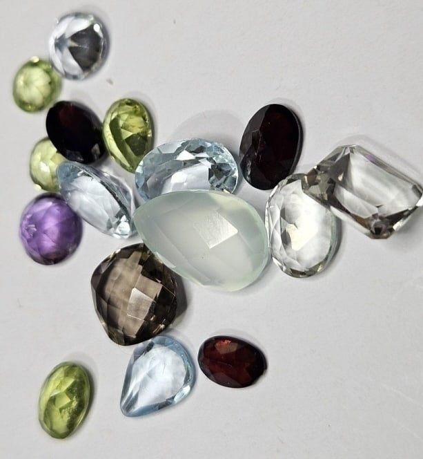 18.85 tcw. Natural Faceted Gemstone Parcel: Item is the exact item in the image- Bidder is responsible for all value and grade determination -