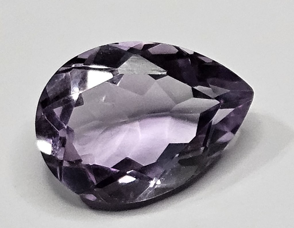 5 ct. Natural Amethyst Pear Shape Gemstone: Item is the exact item in the image- Bidder is responsible for all value and grade determination- Please review all terms and conditions prior to placing any bids - All bids are an agreement to pay fo