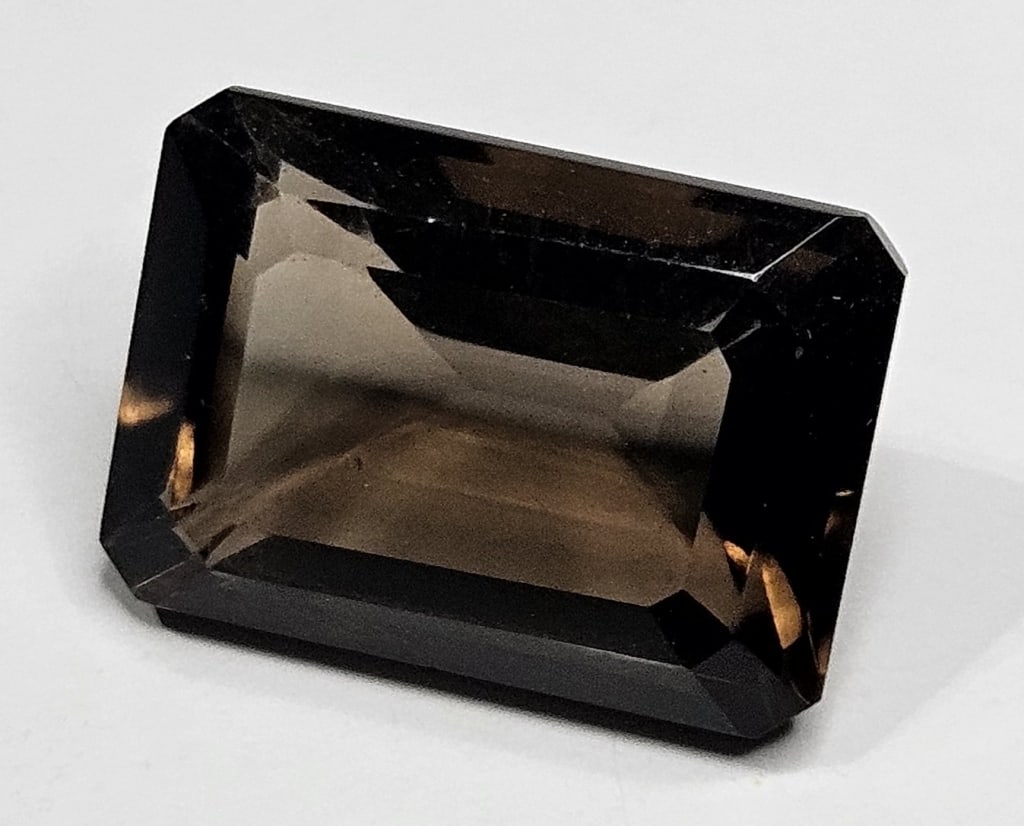 6.75 ct. Natural Smoky Quartz Gemstone: Item is the exact item in the image- Bidder is responsible for all value and grade determination- Please review all terms and conditions prior to placing any bids - All bids are an
