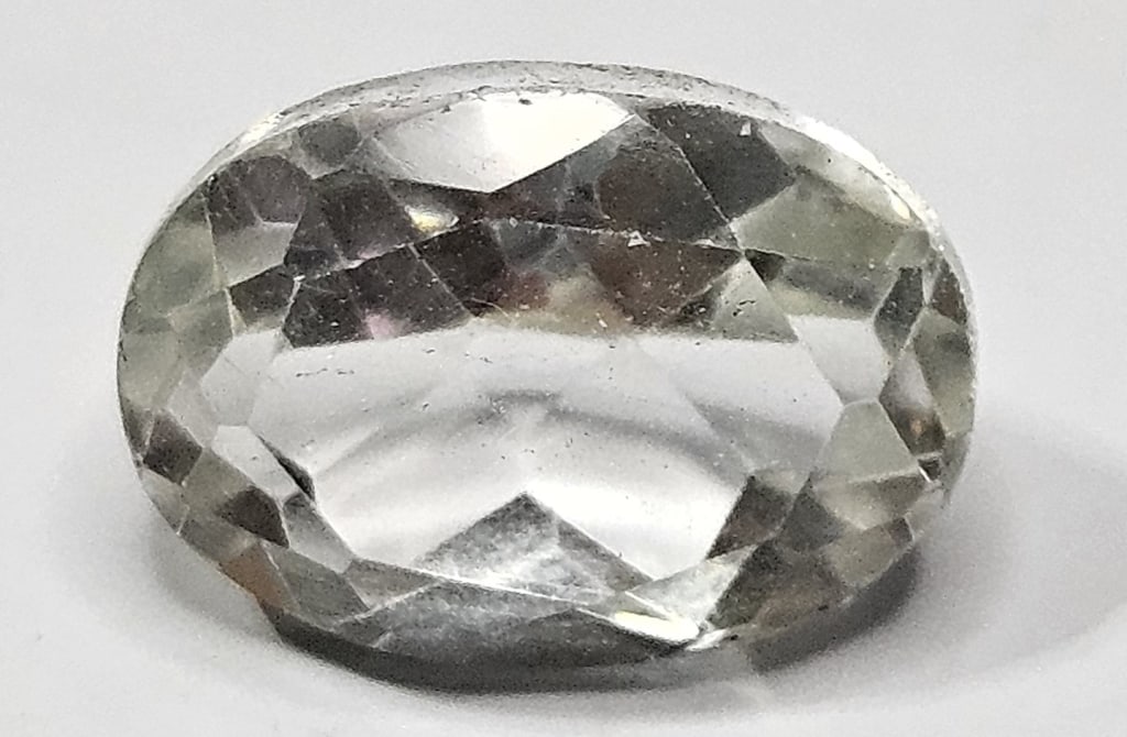 7 ct. Natural Faceted Quartz Gemstone: Items are as described in the tile - Please use the image to verify the item - Please review the entire terms and conditions prior to placing any bids- All sales final -