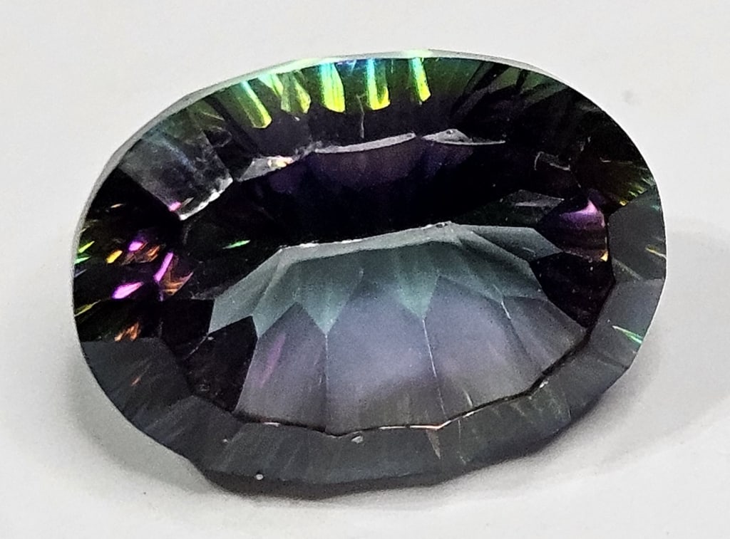 13.80 ct. Natural Mystic Topaz Gemstone: Items are as described in the tile - Please use the image to verify the item - Please review the entire terms and conditions prior to placing any bids- All sales final -