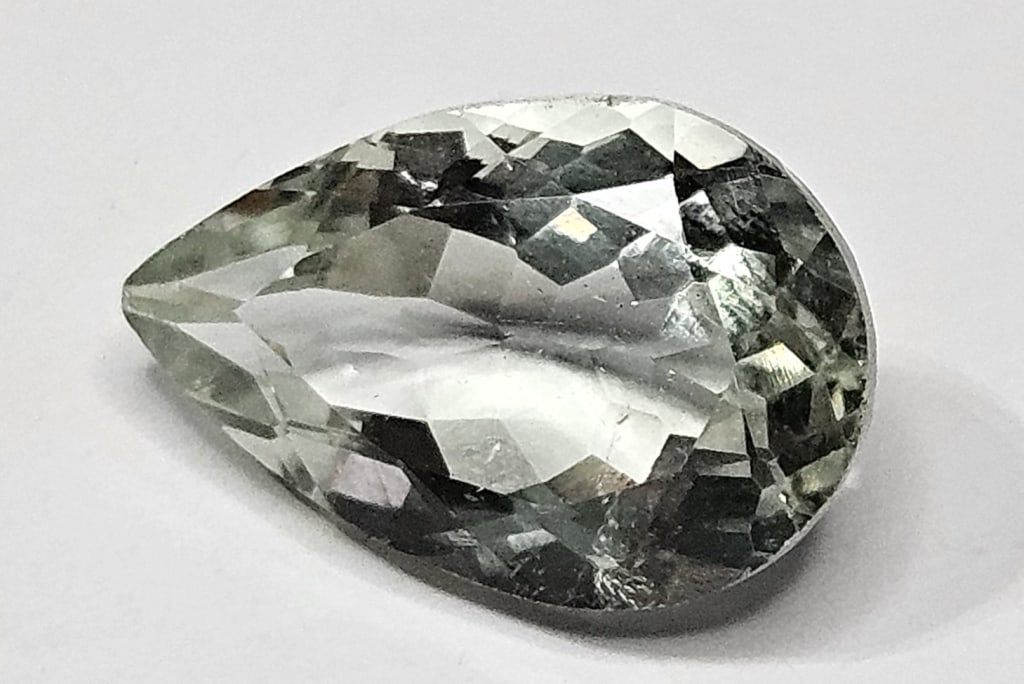 4.70 ct. Natural Prasiolite Pear Shape Gem: Items are as described in the tile - Please use the image to verify the item - Please review the entire terms and conditions prior to placing any bids- All sales final -