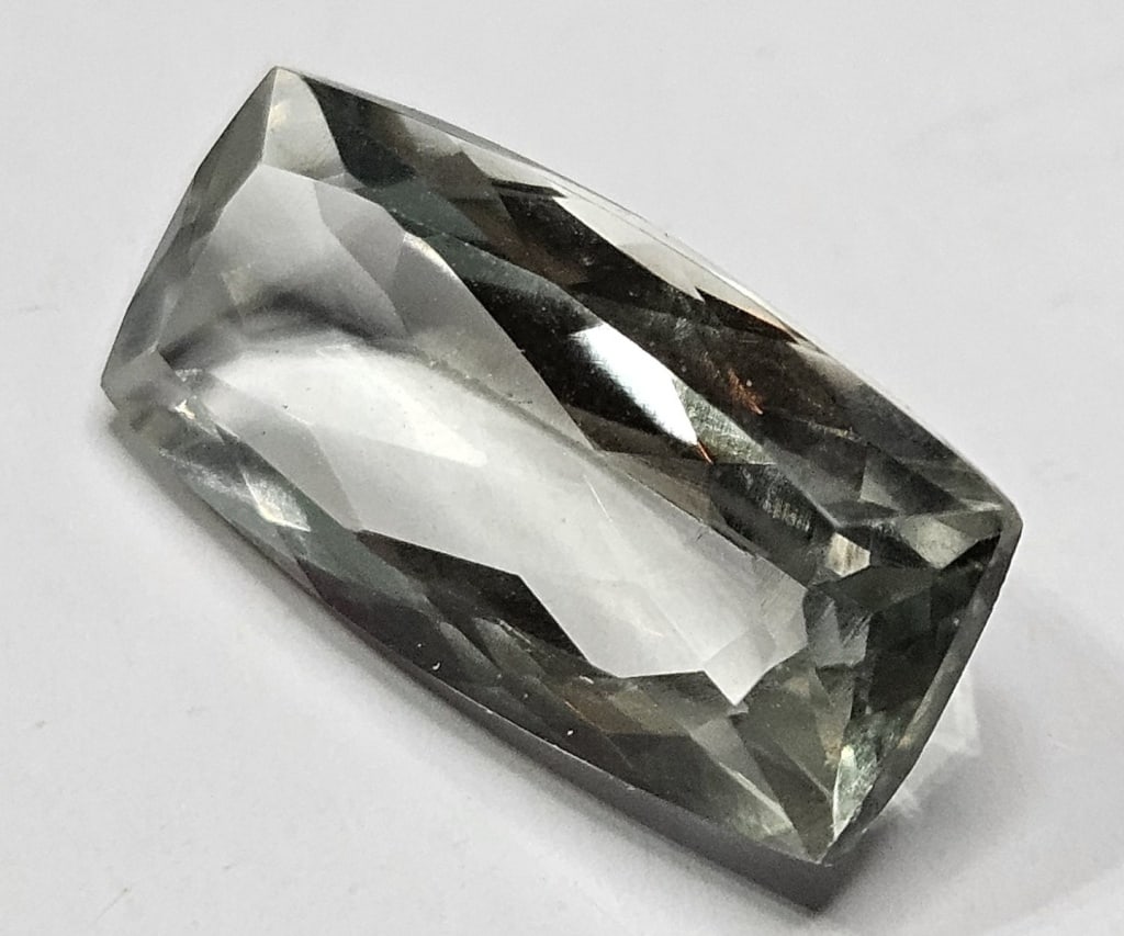 7.30 ct. Fancy Rectangle Cut Green Quartz Gemstone: Item is the item in the image - Bidder is responsible for all value and grade determination - Please review all terms prior to placing any bids -Any bid is an agreement to all terms.