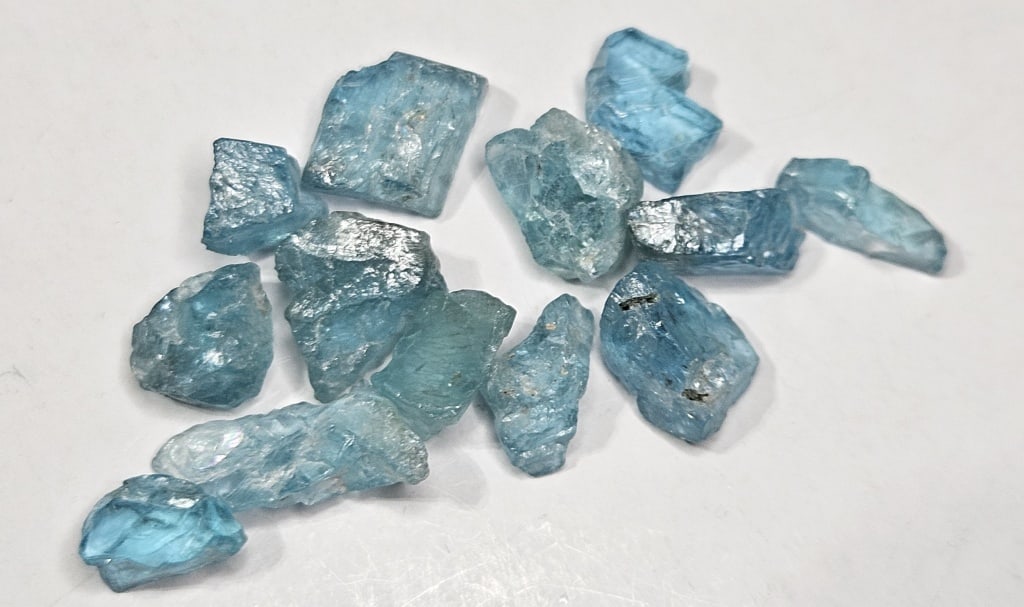 29.2 tcw. Natural Rough Aqua Marine Gem Parcel: Item is the exact item in the image - Bidder is responsible for all value and grade determination - Please review all terms prior to placing any bids - All bids are an agreement to all terms