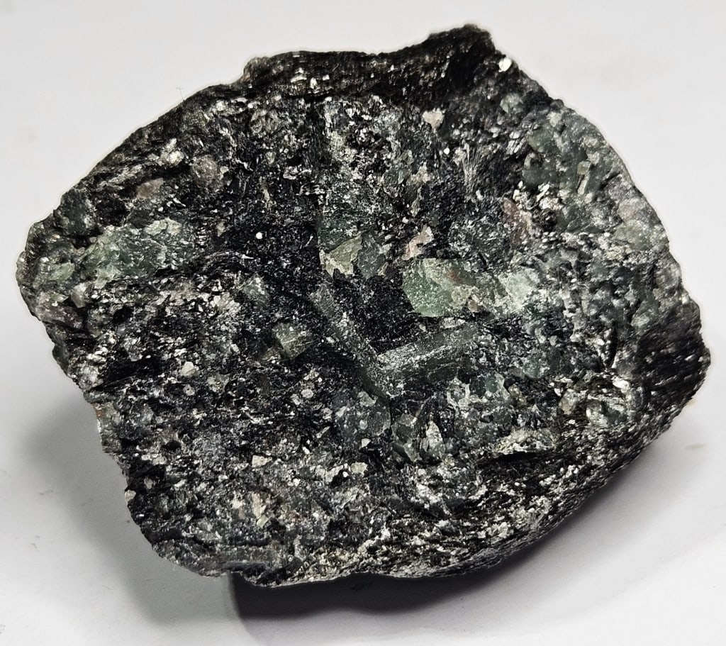 32.23 gram Natural Rough Emerald Specimen: Item is the exact item in the image - Bidder is responsible for all value grade determination - Please review all terms and conditins prior to placing any bids- All sales are final and all invoices du