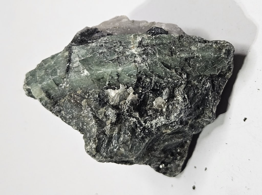 32.34 gram Natural Rough Emerald Specimen: Item is the exact item in the image - Bidder is responsible for all value grade determination - Please review all terms and conditins prior to placing any bids- All sales are final and all invoices du