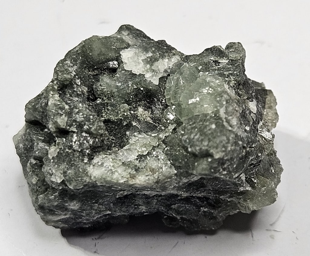 20.50 gram Natural Rough Emerald Specimen: Item is the exact item in the image - Bidder is responsible for all value grade determination - Please review all terms and conditions prior to placing any bids- All sales are final and all invoices d