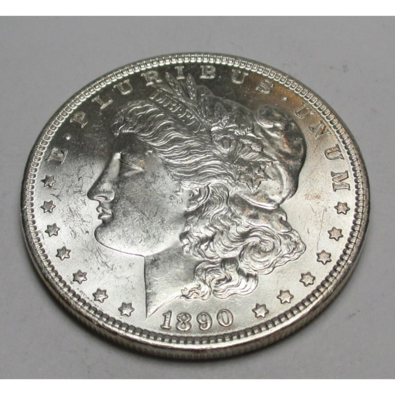 1890 P Bu Grade Morgan Dollar: Type will be our choice and from on hand at time of sale. Item is the EXACT ITEM in the image. Bidder is responsible for all value and determination of value. The images are high resolutionandtheEXACT
