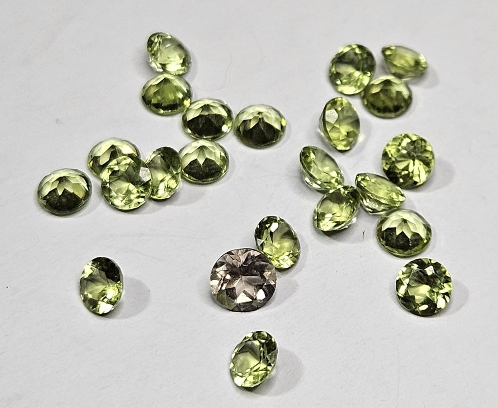 6.95 tcw. Natural Peridot Gemstone Parcel: Items are as described in the tile - Please use the image to verify the item - Please review the entire terms and conditions prior to placing any bids- All sales final -
