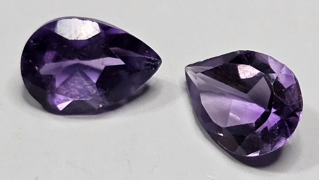 3.35 tcw. Pear Shape Amethyst Gemstone Pair: Item is the item in the image - Bidder is responsible for all value and grade determination - Please review all terms prior to placing any bids -Any bid is an agreement to all terms.