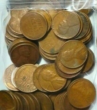 Bag of 100 pcs. Random Date Wheat Cents: An unsearched bag counted from large hoard into parcels of 100 pcs. WInning bidder wins ONE bag of 100 coins.