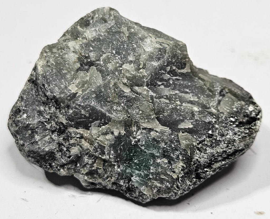 25.55 gram Natural Rough Emerald Specimen: Item is the exact item in the image - Bidder is responsible for all value grade determination - Please review all terms and conditions prior to placing any bids- All sales are final and all