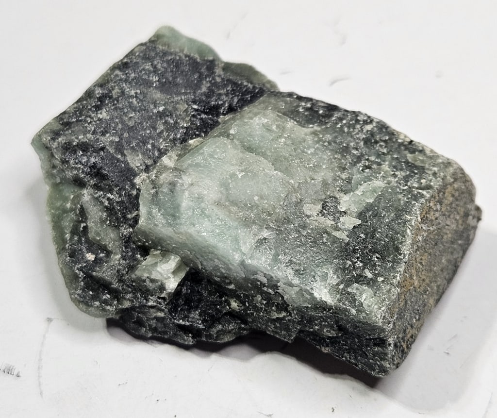 23.42 gram Natural Rough Emerlad Specimen: Item is the exact item in the image - Bidder is responsible for all value grade determination - Please review all terms and conditions prior to placing any bids- All sales are final and all invoices d