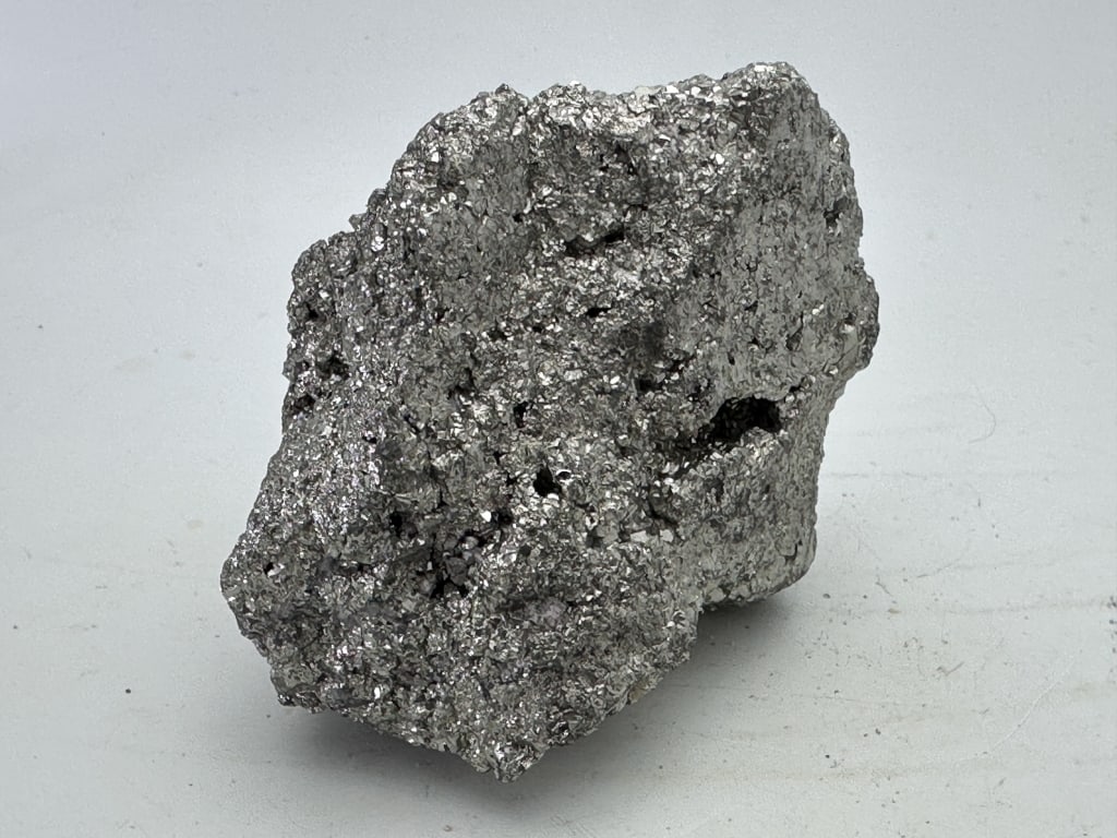 768.45 gram Natural Pyrite Specimen: Pyrite's metallic luster and pale brass-yellow hue give it a superficial resemblance to gold, hence the well-known nickname of fool's gold. The color has also led to the nicknames brass, brazzle,