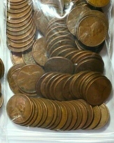 Bag of 100 pcs. Random Date Wheat Cents: An unsearched bag counted from large hoard into parcels of 100 pcs. WInning bidder wins ONE bag of 100 coins.