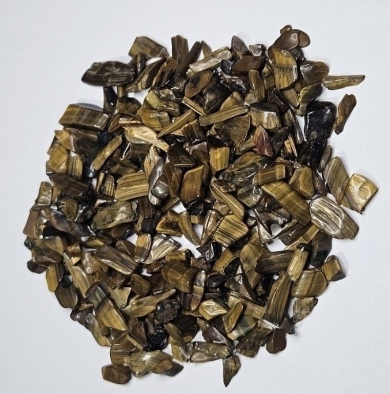 25.07 gram Natural Tiger Eye Tumbled Chips: Item is the item in the image - Bidder is responsible for all value and grade determination - Please review all terms and conditions prior to placing any bids- All 