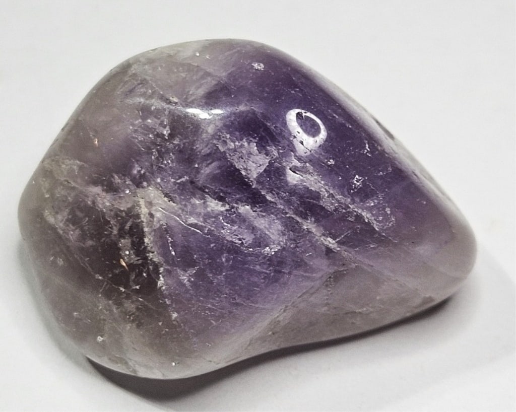 33 gram Natural Amethyst Tumble Stone: Item is the item in the image - Bidder is responsible for all value and grade determination - Please review all terms and conditions prior to placing any bids- All 