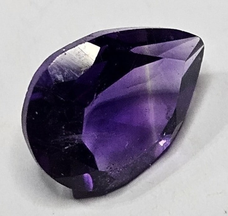 1.90 ct. natural Amethyst Pear Gemstone: Item is the exact item in the image- Bidder is responsible for all value and grade determination -