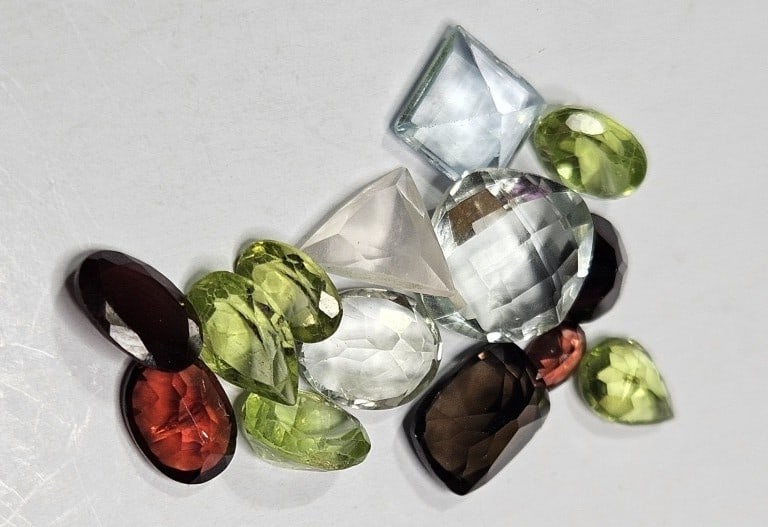 14.95 tcw. Natural Faceted Gemstone lot: Item is the exact item in the image- Bidder is responsible for all value and grade determination -