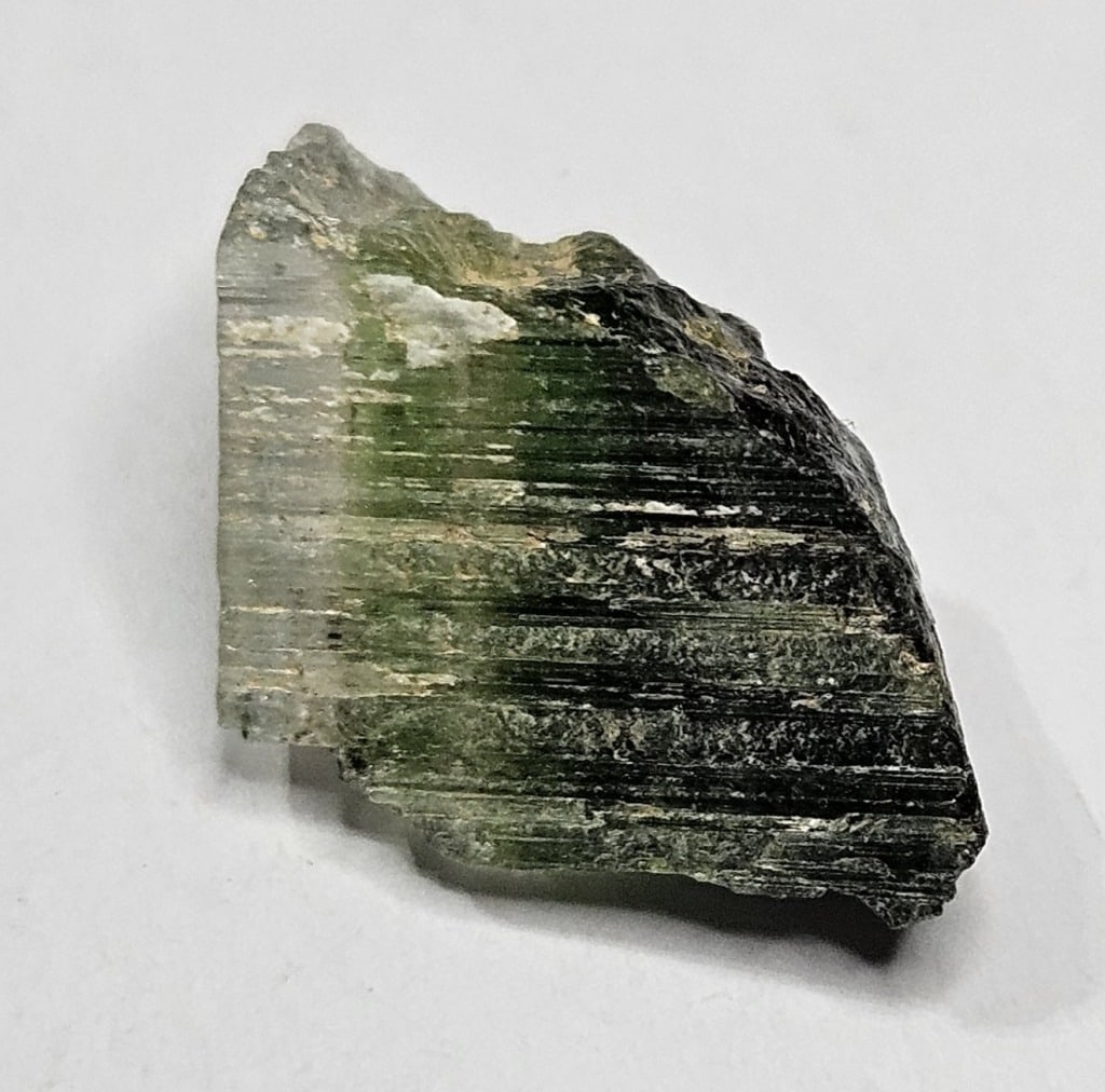 11.25 ct. Gem Grade Tourmaline Crystal: Item is the exact item in the image- Bidder is responsible for all value and grade determination -