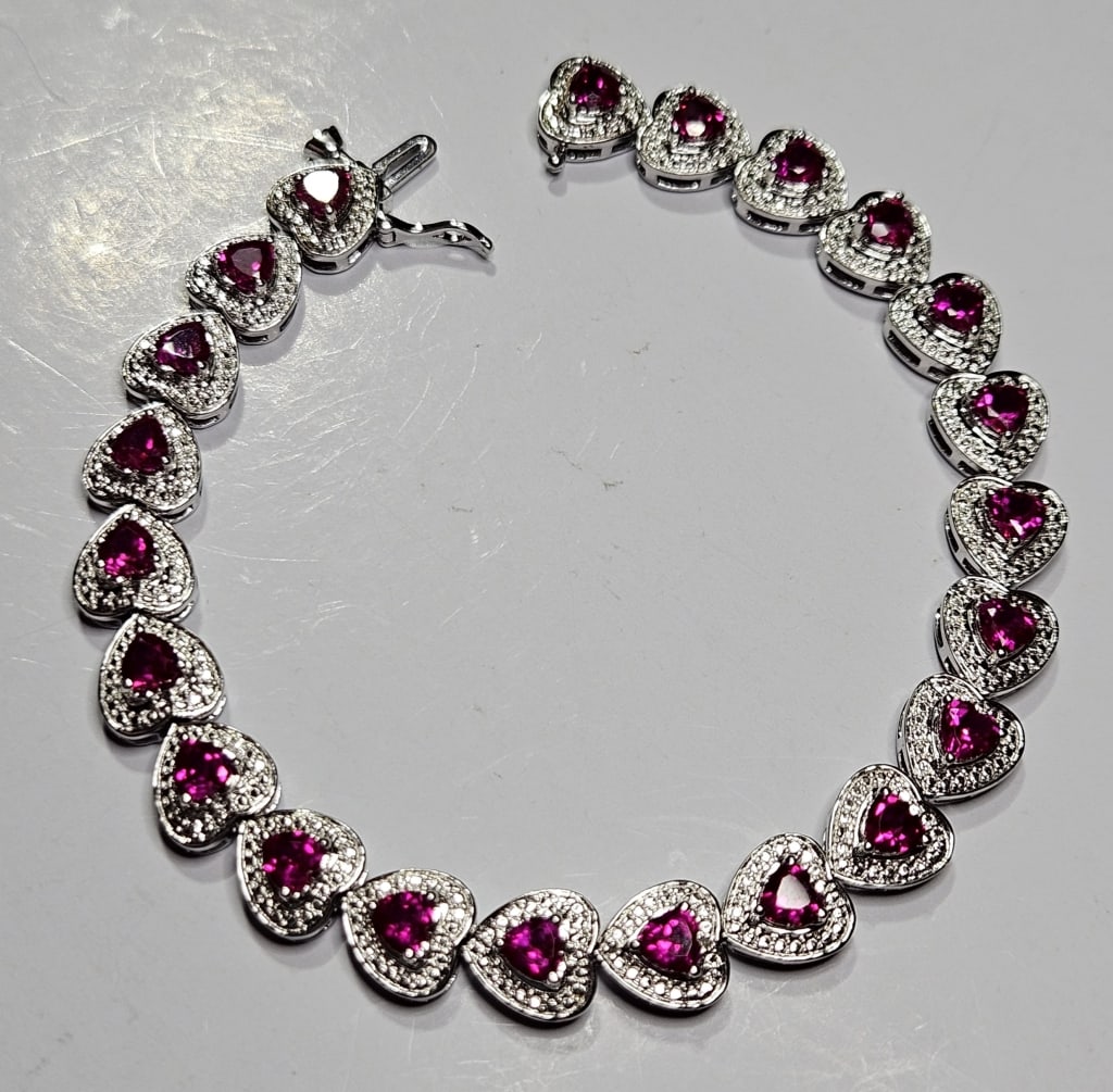 Sterling Silver Pink Topaz Bracelet - 15 grams: Item is the exact item in image - Bidder is responsible for all value and grade determination - Please review all terms prior to placing any bids- Any bid is an agreement to all terms and