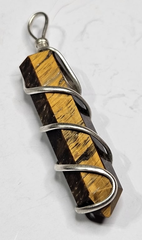 Tigers Eye Pendant Point in Metal Wrap: Item is the exact item in image - Bidder is responsible for all value and grade determination - Please review all terms prior to placing any bids- Any bid is an agreement to all terms and